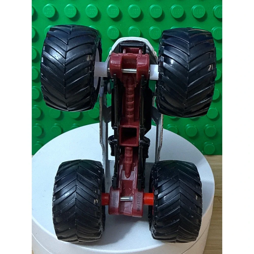 Monster Jam Zombie Monster Truck 1:64 Scale Die-Cast White Red Chassis BKT Tires